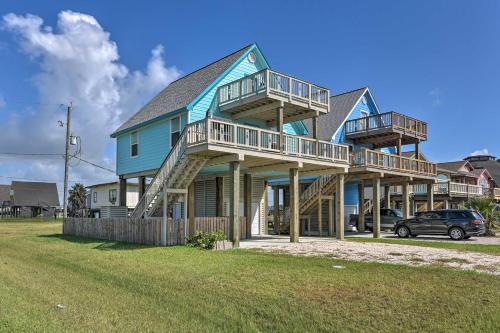 a house with two decks and a car parked in front at 2 Blocks to Gulf Surfside Beach Family Home! in Surfside Beach