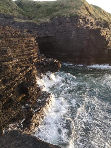 an aerial view of the ocean near a rocky coastline at Ocean Heights B&B in Lissadell