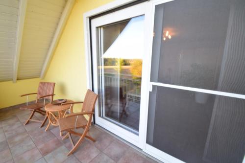Ein Balkon oder eine Terrasse in der Unterkunft Ferienwohnung INGRID