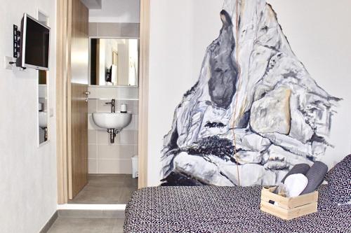 Postel nebo postele na pokoji v ubytování bedandclimbing