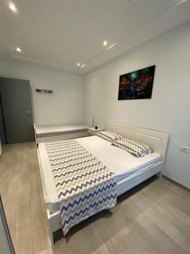 Postel nebo postele na pokoji v ubytování Residence haouari