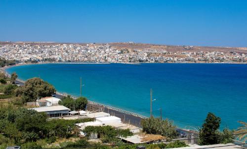 a view of a city and a body of water at Bay View Apts II in Sitia