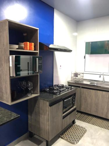 Kuchyň nebo kuchyňský kout v ubytování Penhasco Residences
