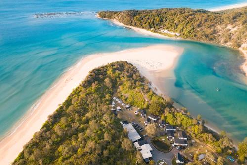 an aerial view of a beach with a resort at The Cove Jervis Bay in Jervis Bay Village