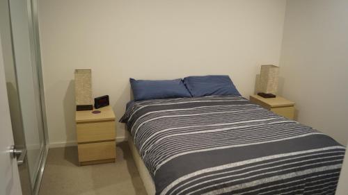 Ένα ή περισσότερα κρεβάτια σε δωμάτιο στο Best Central Location