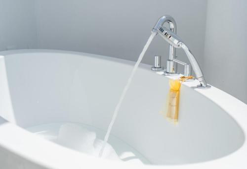 aabinet with a bunch ofabinets in a bathroom at La Residencia Puerto Hotel & Spa in Tarifa