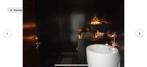 a bathroom with a white sink in a room at Villa moderne avec piscine, front de mer in Casablanca