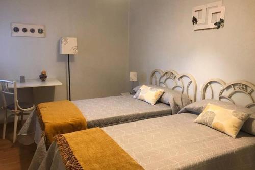 Postel nebo postele na pokoji v ubytování cuartin del camino