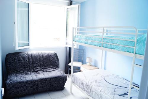 Un ou plusieurs lits superposés dans un hébergement de l'établissement Gite One Luchon appartement 6 pers ou plus