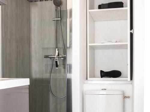 a bathroom with a shower and a toilet in it at La Cle des Expos "In Paris" in Vanves