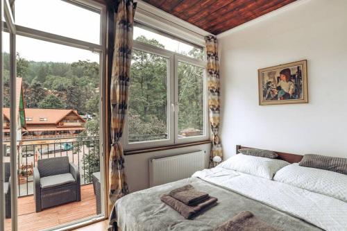 Posteľ alebo postele v izbe v ubytovaní Duszniki-Zdrój Przytulny Apartament z Tarasem