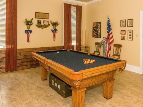a pool table in a living room with sidx sidx sidx at Holly House of Hamilton in Hamilton
