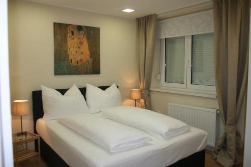 Posteľ alebo postele v izbe v ubytovaní Vienna City Domizil - Apartment