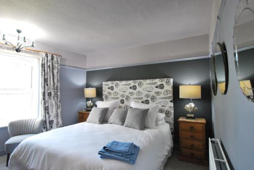 Кровать или кровати в номере Kentwood Guest House