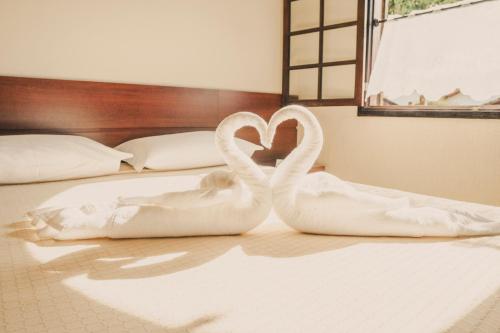 Katil atau katil-katil dalam bilik di Hotel Fazenda Ramon