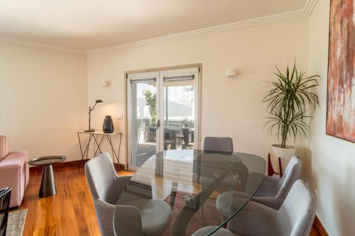 a living room filled with furniture and a window at Apt in Lisbon Oriente 25 - Parque das Nações in Lisbon