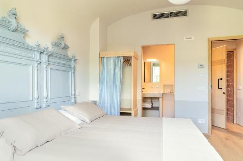 Postel nebo postele na pokoji v ubytování CUGUSI BnB