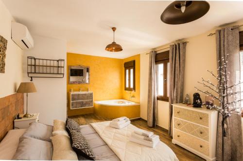 En eller flere senger på et rom på La posada del Cani