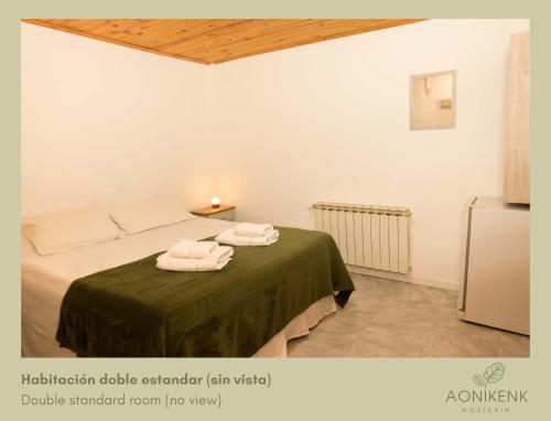Ένα ή περισσότερα κρεβάτια σε δωμάτιο στο Hostería Aonikenk