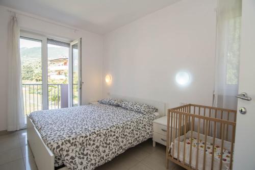 Cama ou camas em um quarto em Appartamenti Laly