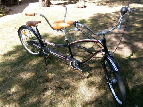 a bike parked on the grass in the yard at Manoir de l'Espérance in Corsept