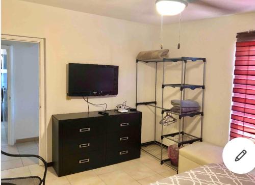 TV a/nebo společenská místnost v ubytování Agradable* y Cómodo Departamento Familiar (WiFi)