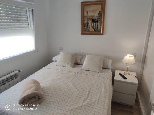 A bed or beds in a room at Habitación AP