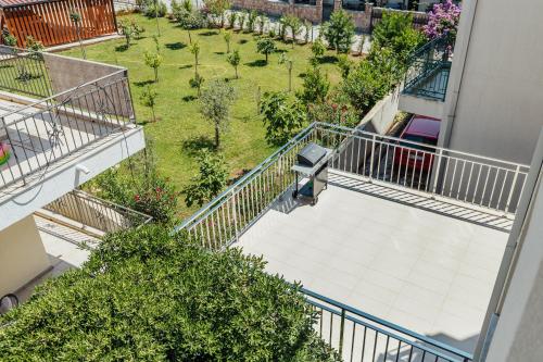 an overhead view of a balcony with a garden at Apartments Villa Swissmonte in Herceg-Novi