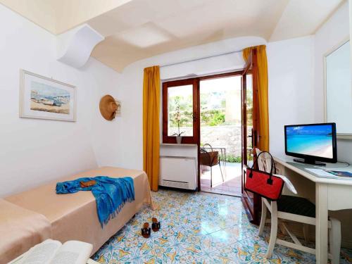 TV a/nebo společenská místnost v ubytování Hotel San Lorenzo Thermal Spa