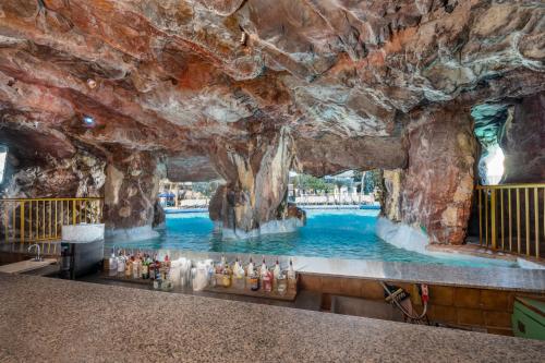 a pool in a cave in a theme park at The Island Resort at Fort Walton Beach in Fort Walton Beach