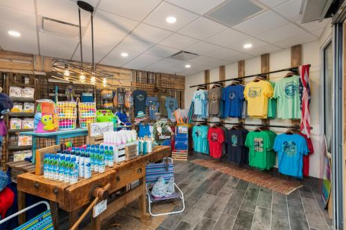 a store with a bunch of shirts on display at The Island Resort at Fort Walton Beach in Fort Walton Beach