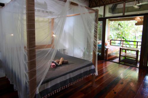 Letto o letti in una camera di Ferra Resort Siargao