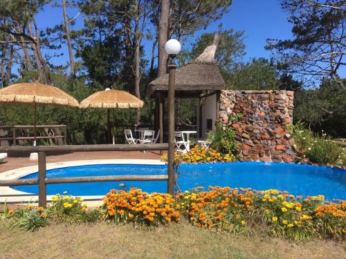 Bazén v ubytování Bungalows Punta Colorada nebo v jeho okolí