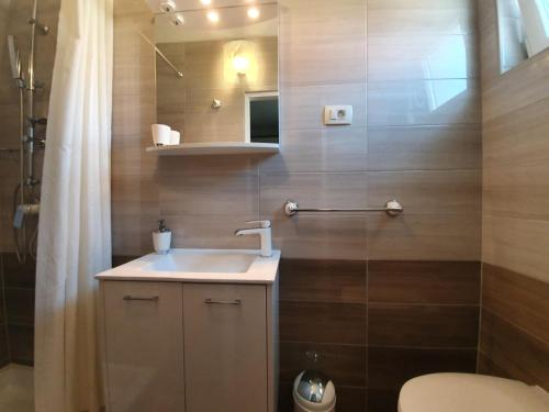 Koupelna v ubytování Rooms Čapo Rab