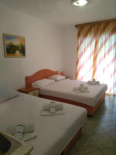 Postel nebo postele na pokoji v ubytování Apartments Matej