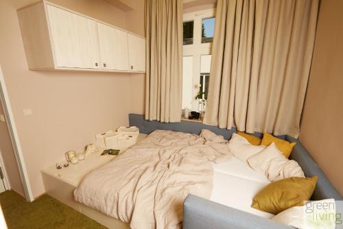מיטה או מיטות בחדר ב-Villa Franz