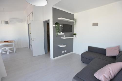 a living room with a couch and a table at Lagos Central Apartments Ap 9 in Lagos