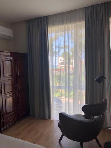 Ein Sitzbereich in der Unterkunft Villa by the Sea