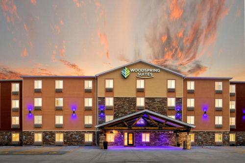 a rendering of a wyncote hotel at WoodSpring Suites Davenport Quad Cities in Davenport