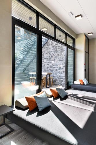 Ένα ή περισσότερα κρεβάτια σε δωμάτιο στο DURBUY SUITES