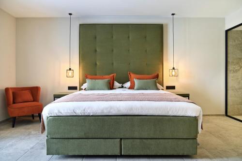 Ένα ή περισσότερα κρεβάτια σε δωμάτιο στο DURBUY SUITES
