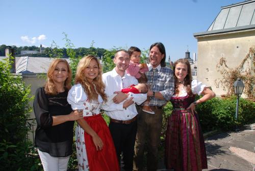 a group of people posing for a picture at Altstadt Hotel Stadtkrug in Salzburg