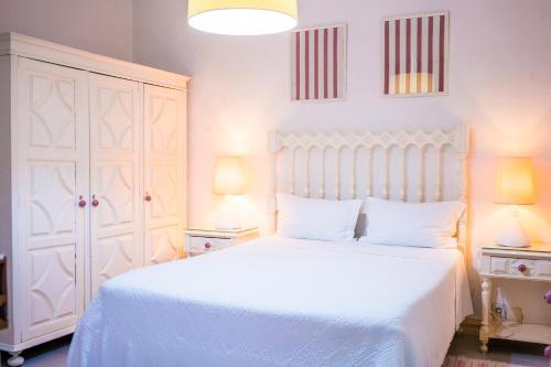 Кровать или кровати в номере Hotel Residencial Alentejana