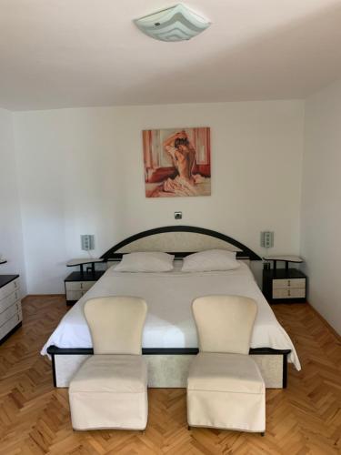 En eller flere senge i et værelse på Apartmaji Klabjan - Kaki