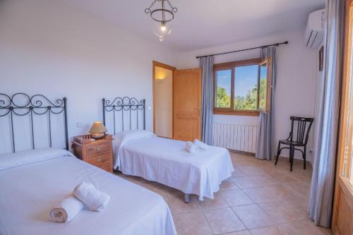 Postel nebo postele na pokoji v ubytování Finca VELA 2 by Mallorca Villa Selection