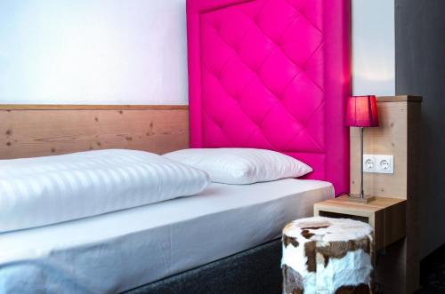 Hotel Markus Sittikus Salzburgにあるベッド