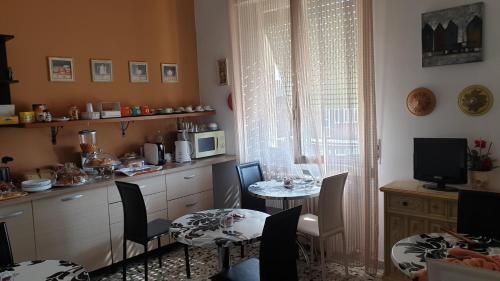 Kuchyň nebo kuchyňský kout v ubytování B&B in Arena L' Opera