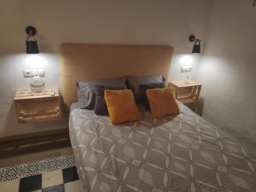 Tempat tidur dalam kamar di Refugio de El Chorro