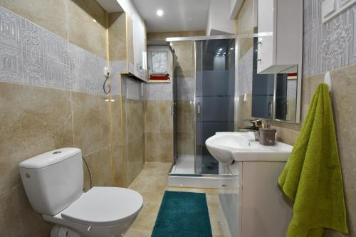 Kúpeľňa v ubytovaní APARTMENTS V+K