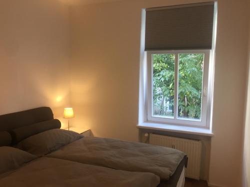 Кровать или кровати в номере Hafen Dock 5